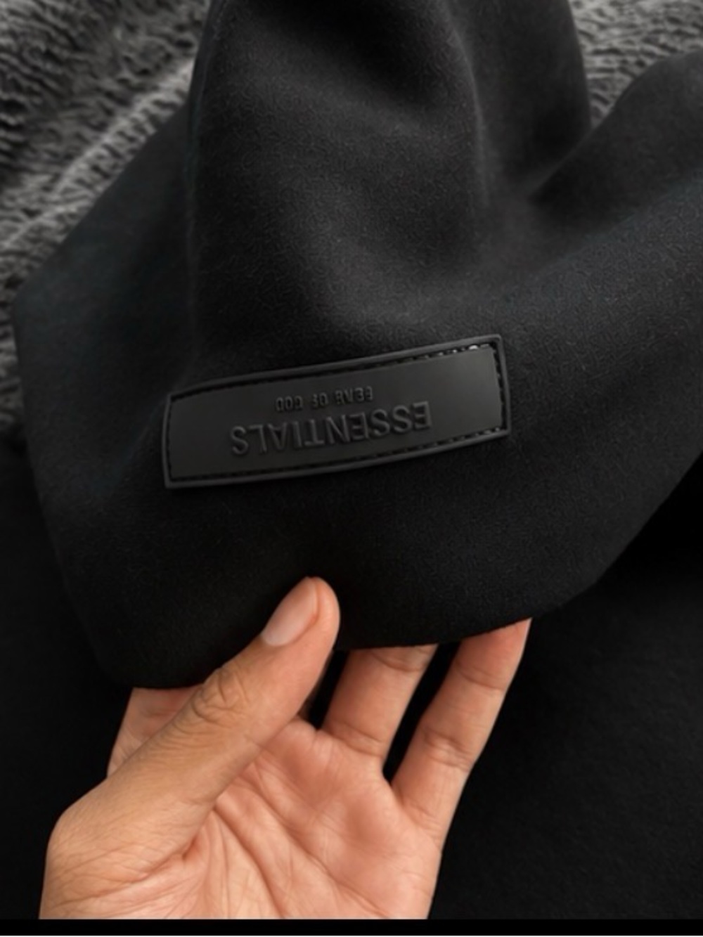 Essentials Black Pullover Hoodie with Embossed Logo
